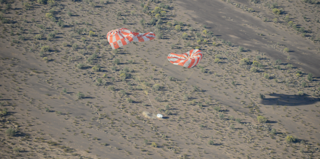 Orion's parachutes deflate after a successful touchdown following a test at the U.S. Army's Yuma Proving Ground on April 23. Image Credit: NASA